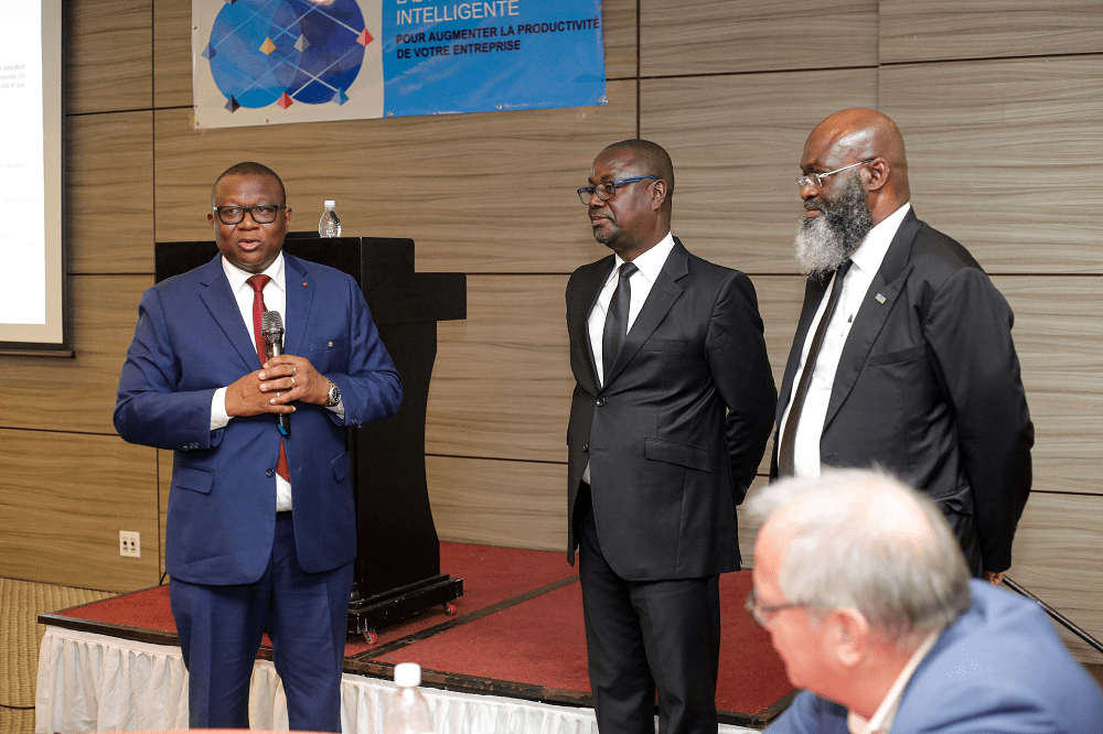 the CEO with the Project Director and the Minister of Communication